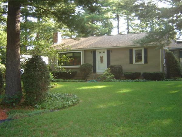 40 County Road Holyoke, MA 01040 - Photo 1 of 19 a front view of house with yard and green space