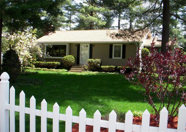 40 County Road Holyoke, MA 01040 - Photo 3 of 19 a front view of house with a garden