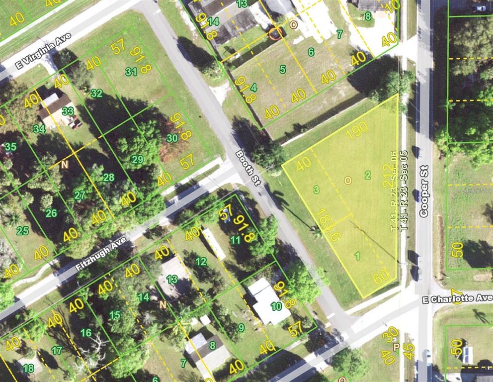 a bird view of a multi story building with a yard