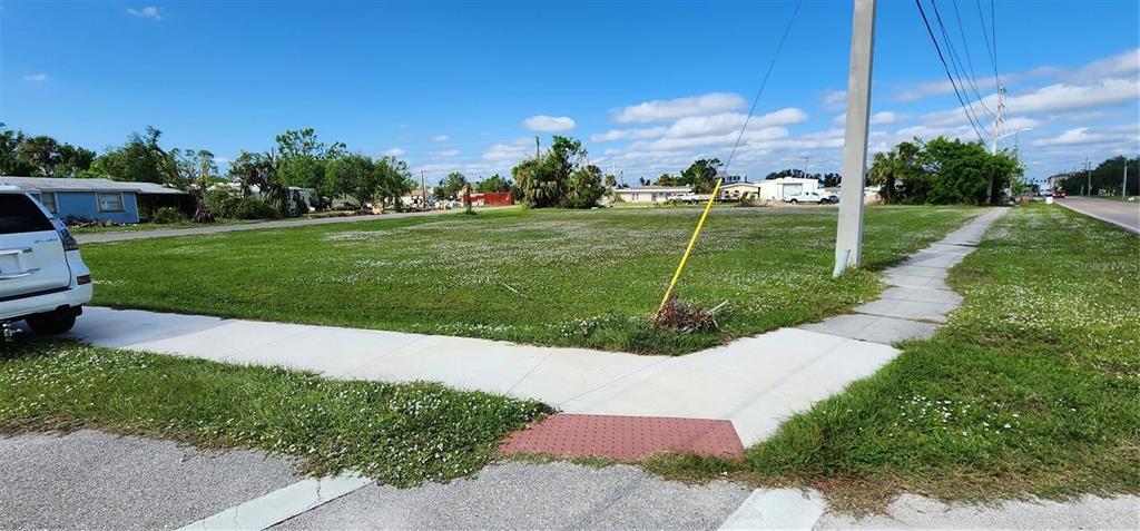 466 Booth Street Punta Gorda, FL 33950 - Photo 3 of 5 a view of a park with houses
