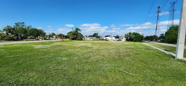 a view of a big yard with a fountain and a big yard