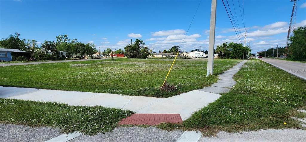 466 Booth Street Punta Gorda, FL 33950 - Photo 5 of 5 a view of a garden with houses