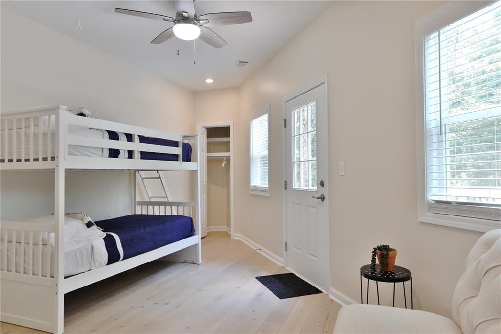2125 Clay Road Southwest Austell, GA 30106 - Photo 13 of 25 a bedroom with a bed and a chandelier