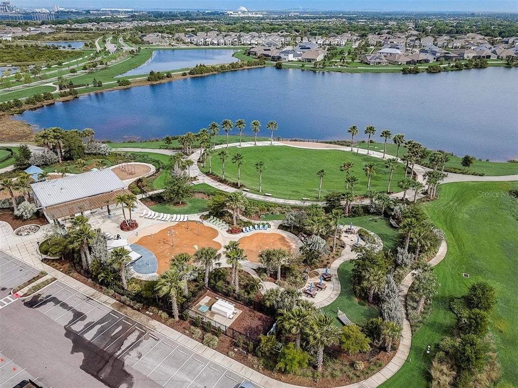 6262 Goldcoast Avenue Apollo Beach, FL 33572 - Photo 40 of 65 an aerial view of a house with a lake view