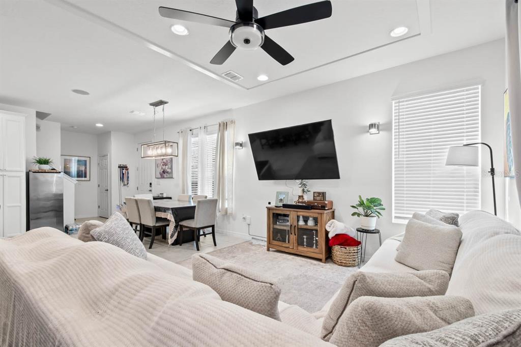 6262 Goldcoast Avenue Apollo Beach, FL 33572 - Photo 4 of 65 a living room with furniture and a flat screen tv