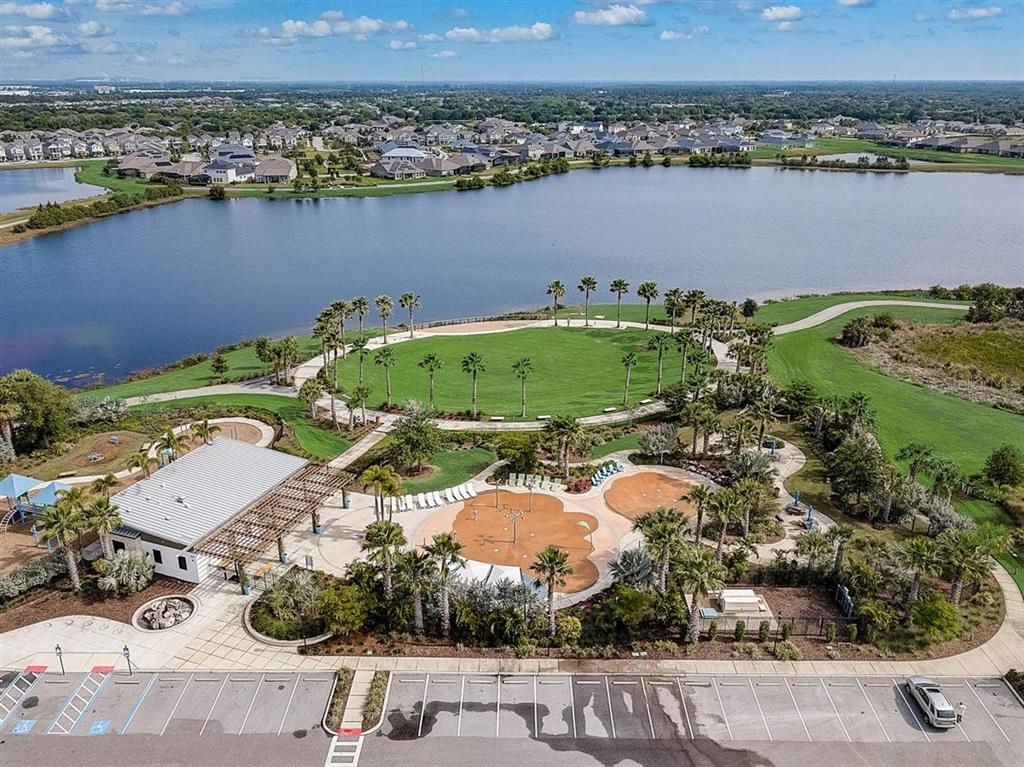 6262 Goldcoast Avenue Apollo Beach, FL 33572 - Photo 42 of 65 an aerial view of a city with lake view