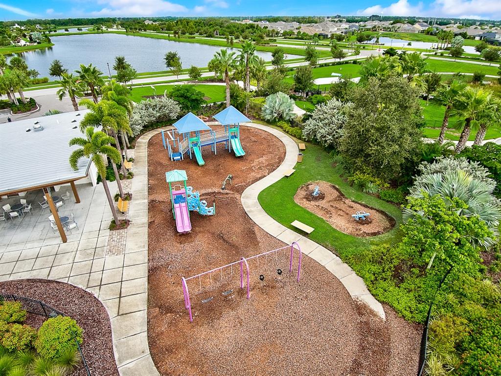 6262 Goldcoast Avenue Apollo Beach, FL 33572 - Photo 50 of 65 an aerial view of a house with a yard basket ball court