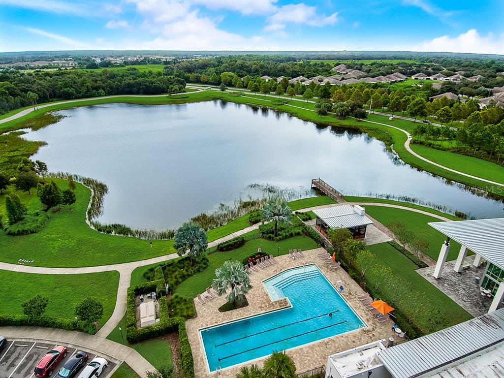 6262 Goldcoast Avenue Apollo Beach, FL 33572 - Photo 60 of 65 an aerial view of house with yard swimming pool and outdoor seating