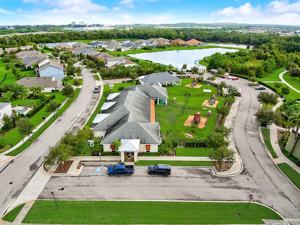 6262 Goldcoast Avenue Apollo Beach, FL 33572 - Photo 64 of 65 an aerial view of a house with garden space and street view