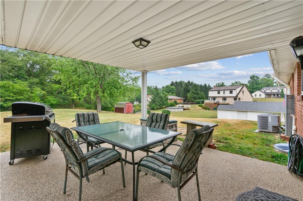 5251 Stella Drive Gibsonia, PA 15044 - Photo 5 of 23 Covered deck perfect for entertaining rain or shine!