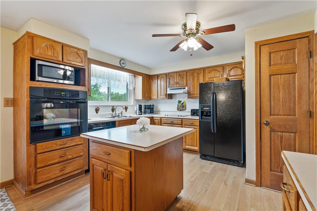 5251 Stella Drive Gibsonia, PA 15044 - Photo 7 of 23 Beautiful cabinets, bright oversized window, pantry and island.