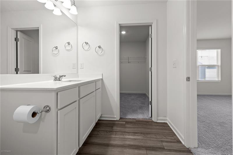 103 Rydal Way Winder, GA 30680 - Photo 18 of 31 a bathroom with a sink mirror and vanity