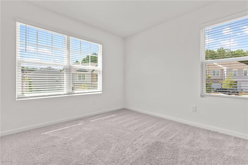 103 Rydal Way Winder, GA 30680 - Photo 21 of 31 a view of an empty room with a window