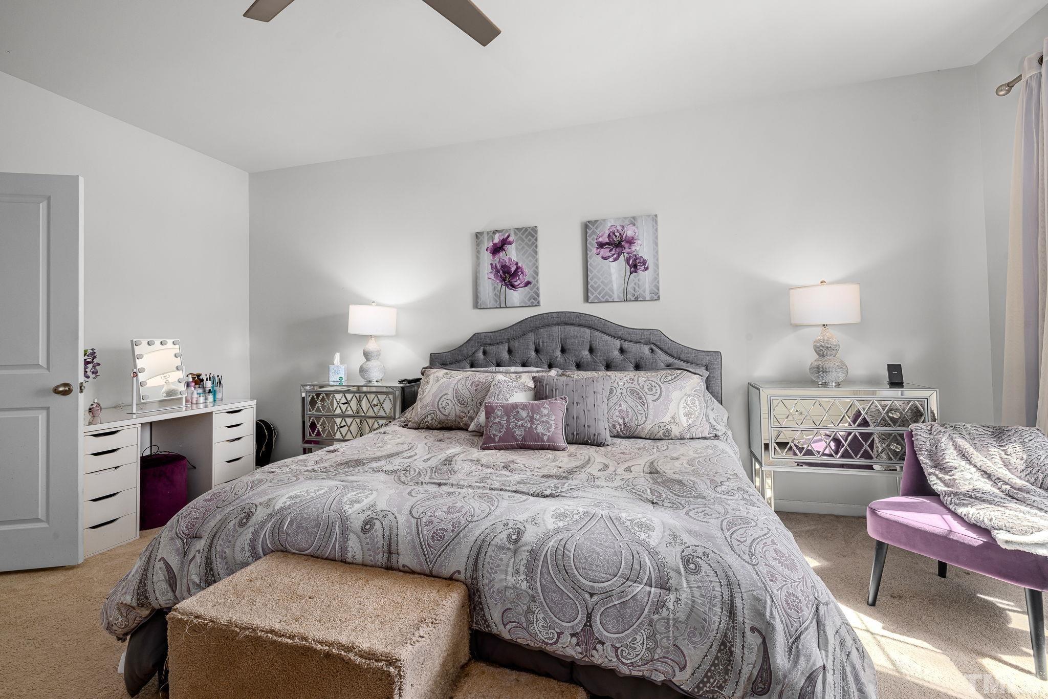 6084 Beale Loop Raleigh, NC 27616 - Photo 20 of 30 a bedroom with a bed and a table