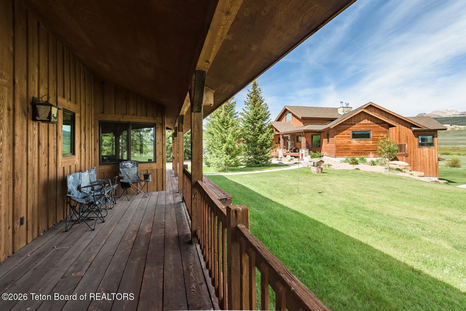 29 White Point Road Cora, WY 82925 - Photo 90 of 102 Guest cabin deck and view of main house