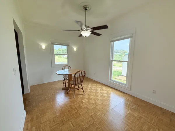 a view of a dining room with furniture