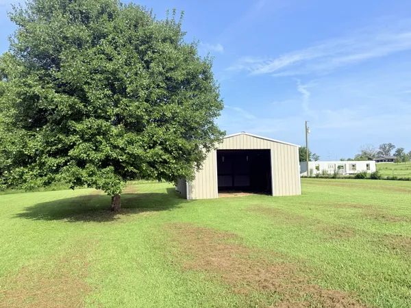 a view of a garden with an empty space