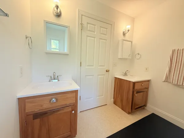 a bathroom with a shower and a toilet