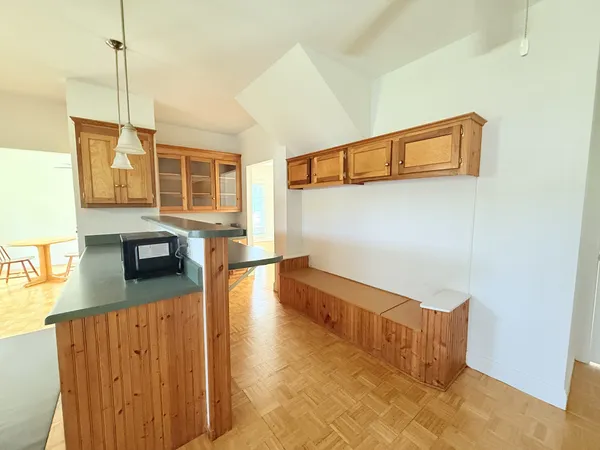 a view of a living room with furniture