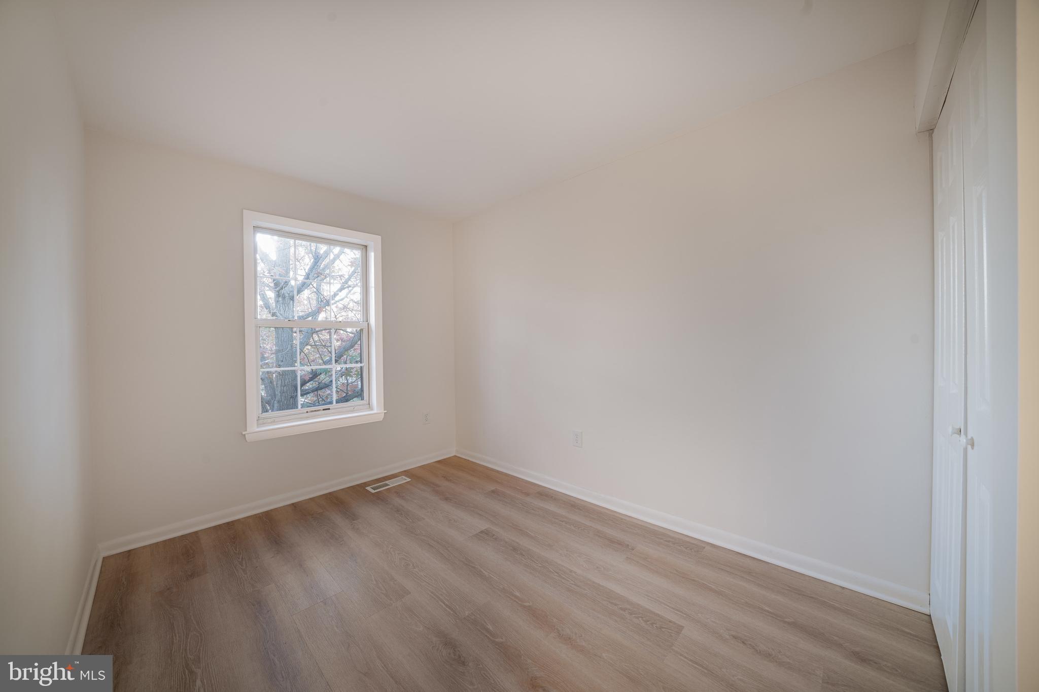 4631 Minnesota Avenue Northeast Washington, DC 20019 - Photo 22 of 28 an empty room with a window