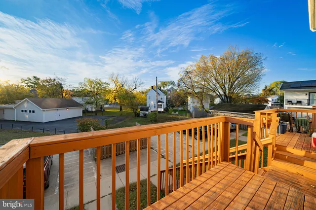a view of a chairs and table on the deck