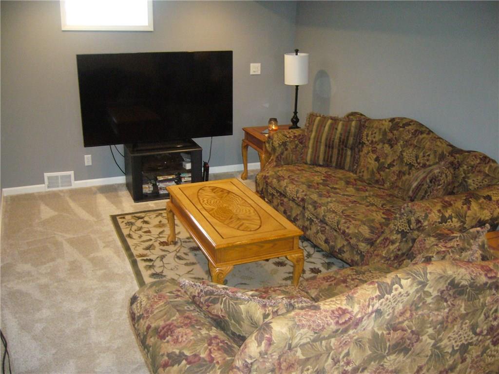 538 Agnew Road Baldwin, PA 15227 - Photo 12 of 17 Lower level family room, new carpet, paint, glass block windows, COZY!