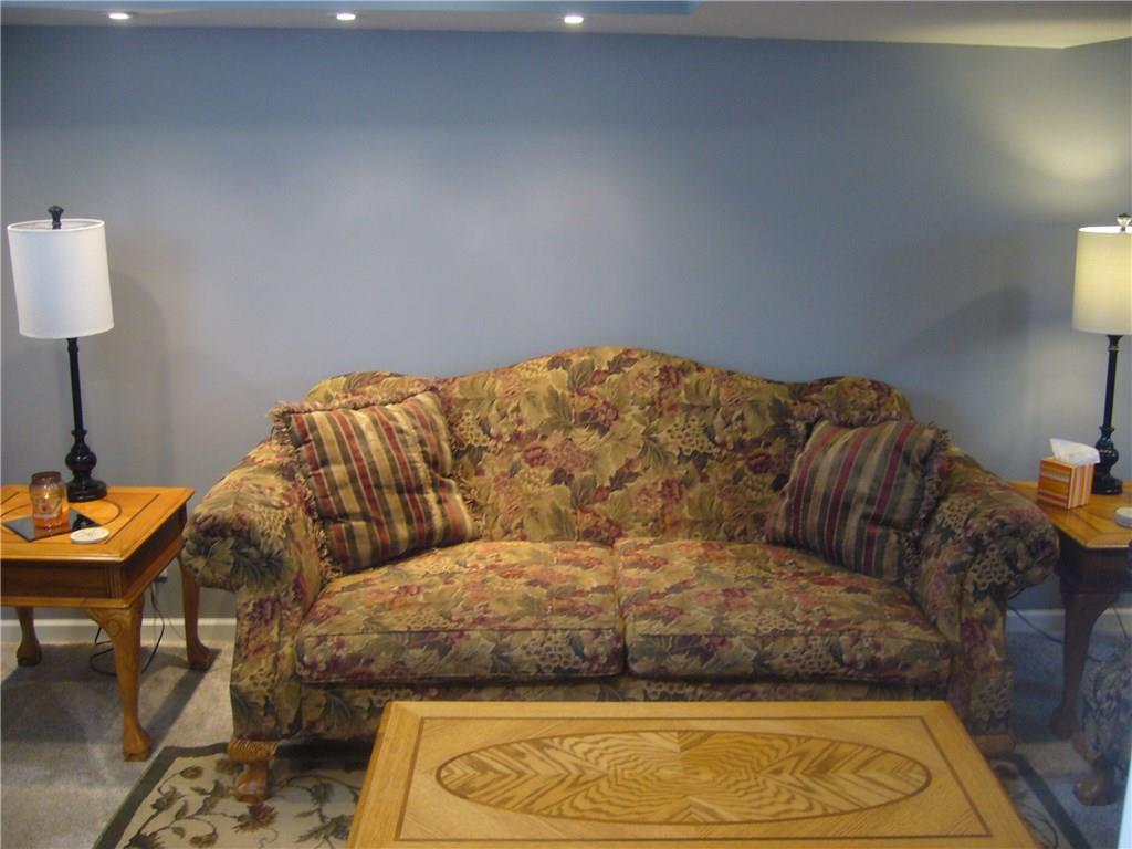 538 Agnew Road Baldwin, PA 15227 - Photo 13 of 17 Another view of the newly completed family room. Recessed lighting and behind the wall to the left of the sofa, are hot and cold water valves incase you would like to do a wet bar!