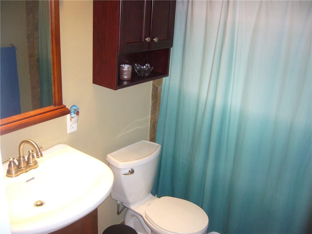 538 Agnew Road Baldwin, PA 15227 - Photo 10 of 17 Updated main floor bathroom, ceramic tile bath/shower.