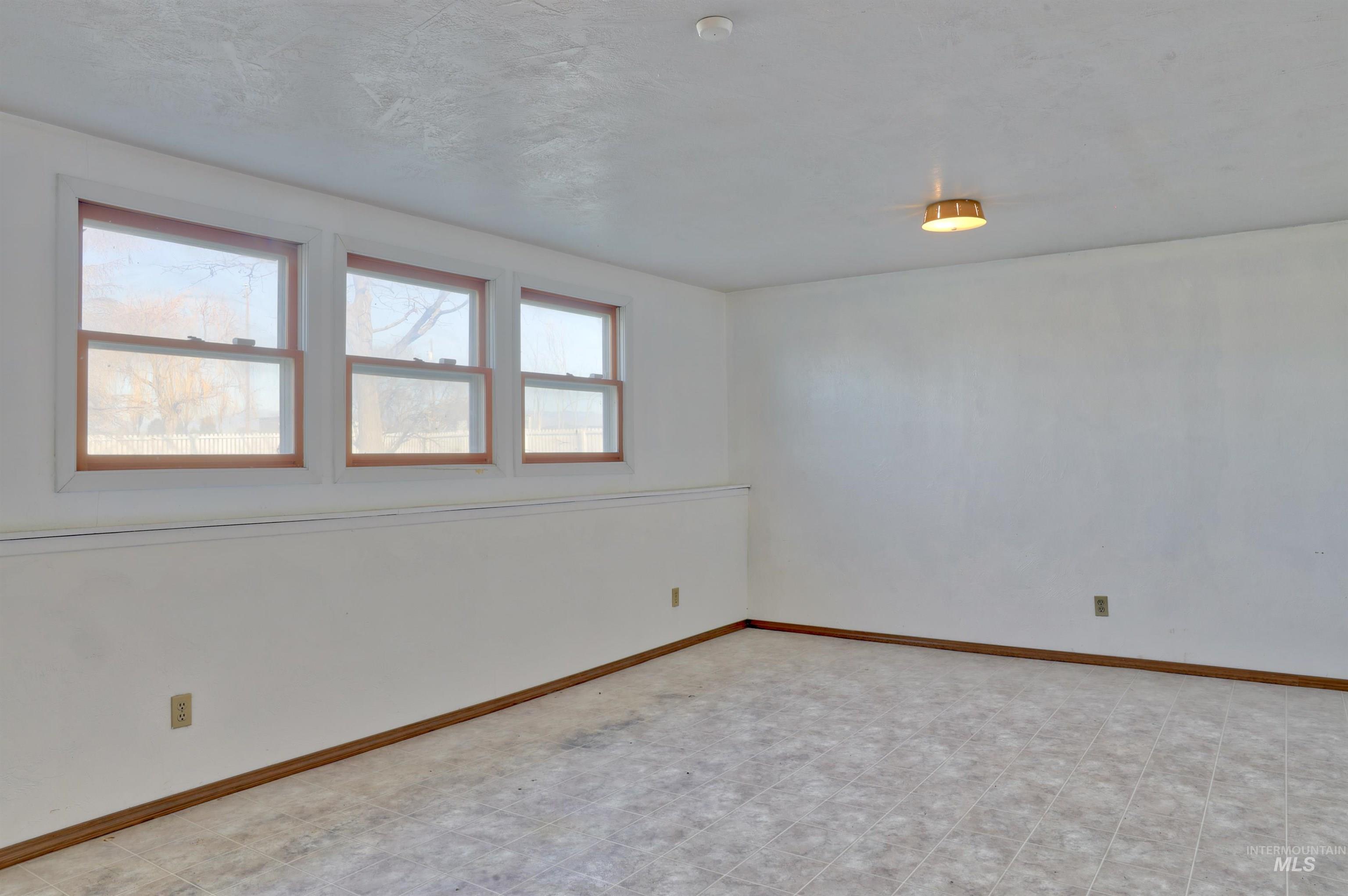 8027 Chuckar Lane Boise, ID 83709 - Photo 16 of 19 Unfurnished room featuring baseboards