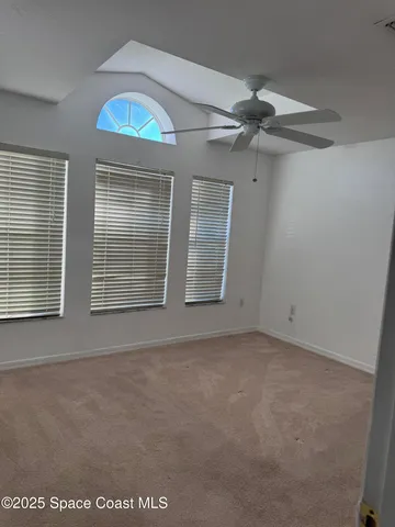 an empty room with windows