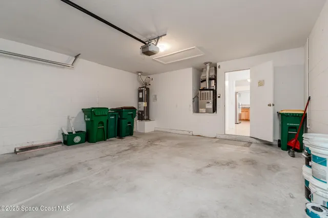 a view of a livingroom with an empty space and a fireplace
