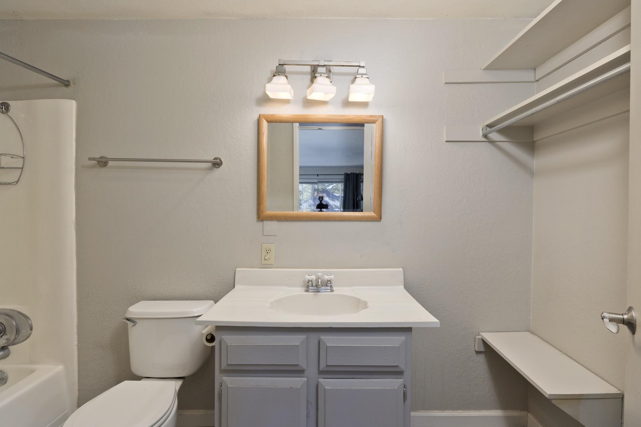 2289 Sierra Nevada Road, Unit G10 Mammoth Lakes, CA 93546 - Photo 16 of 23 Full bathroom featuring vanity, shower / tub combination, and a textured wall