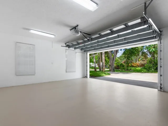 a view of a chair and table in the patio