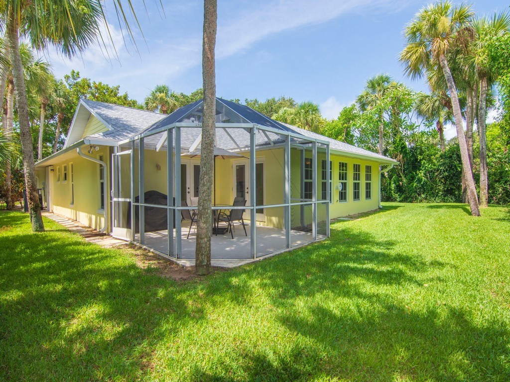 765 Date Palm Road Vero Beach, FL 32963 - Photo 26 of 36 a view of a house with a yard and sitting area