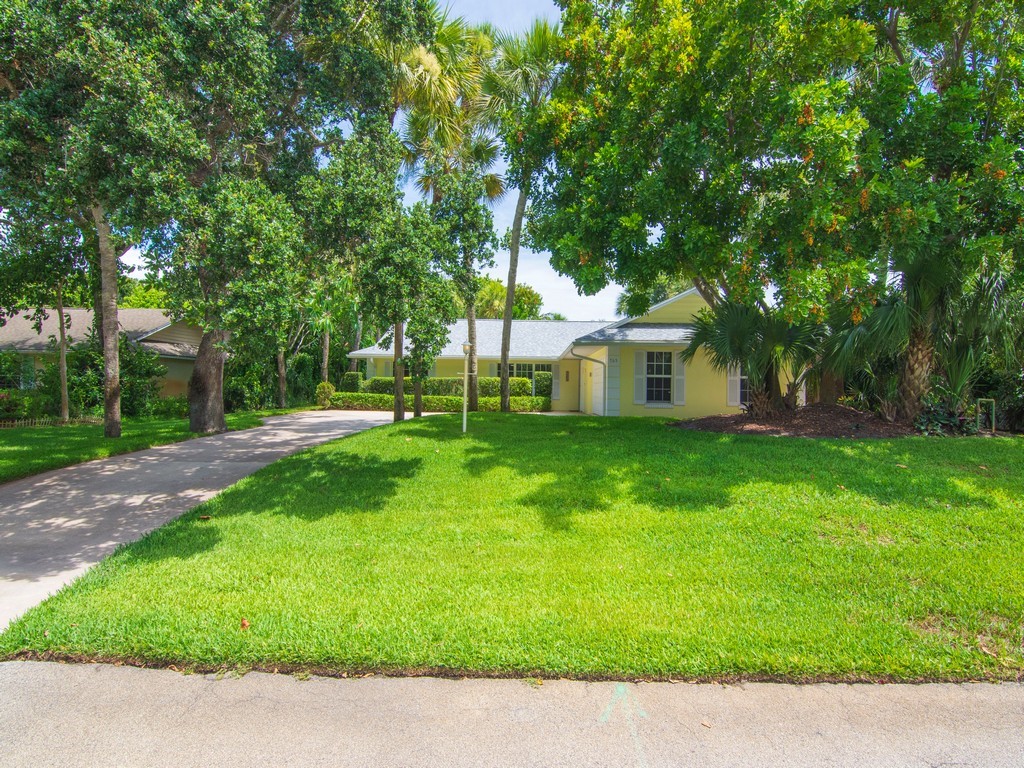 765 Date Palm Road Vero Beach, FL 32963 - Photo 33 of 36 a view of a house with a yard