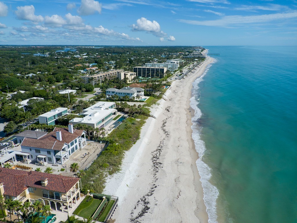 765 Date Palm Road Vero Beach, FL 32963 - Photo 36 of 36 a view of a lake with a city