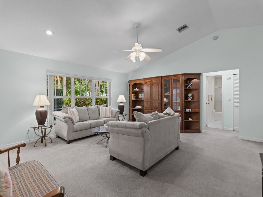 765 Date Palm Road Vero Beach, FL 32963 - Photo 4 of 36 a living room with furniture and a window