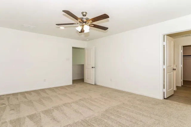 a bathroom with a sink a mirror and a shower