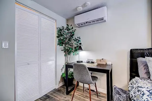 a view of a workspace with furniture