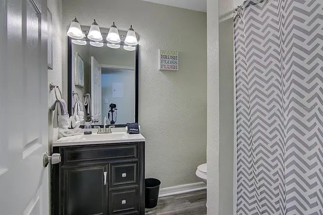 a bathroom with a sink and a toilet