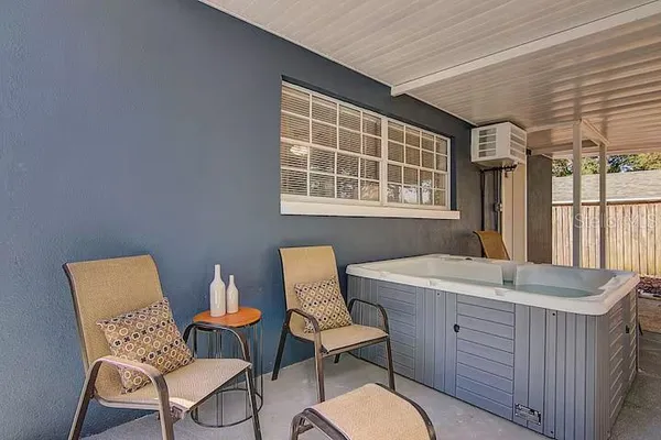 a dining room with a table and chairs