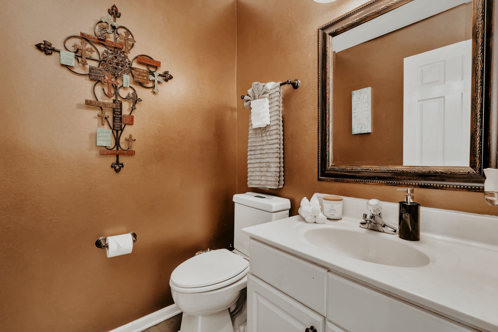 7312 Atkinson Circle Plainfield, IL 60586 - Photo 12 of 27 a bathroom with a toilet sink and mirror
