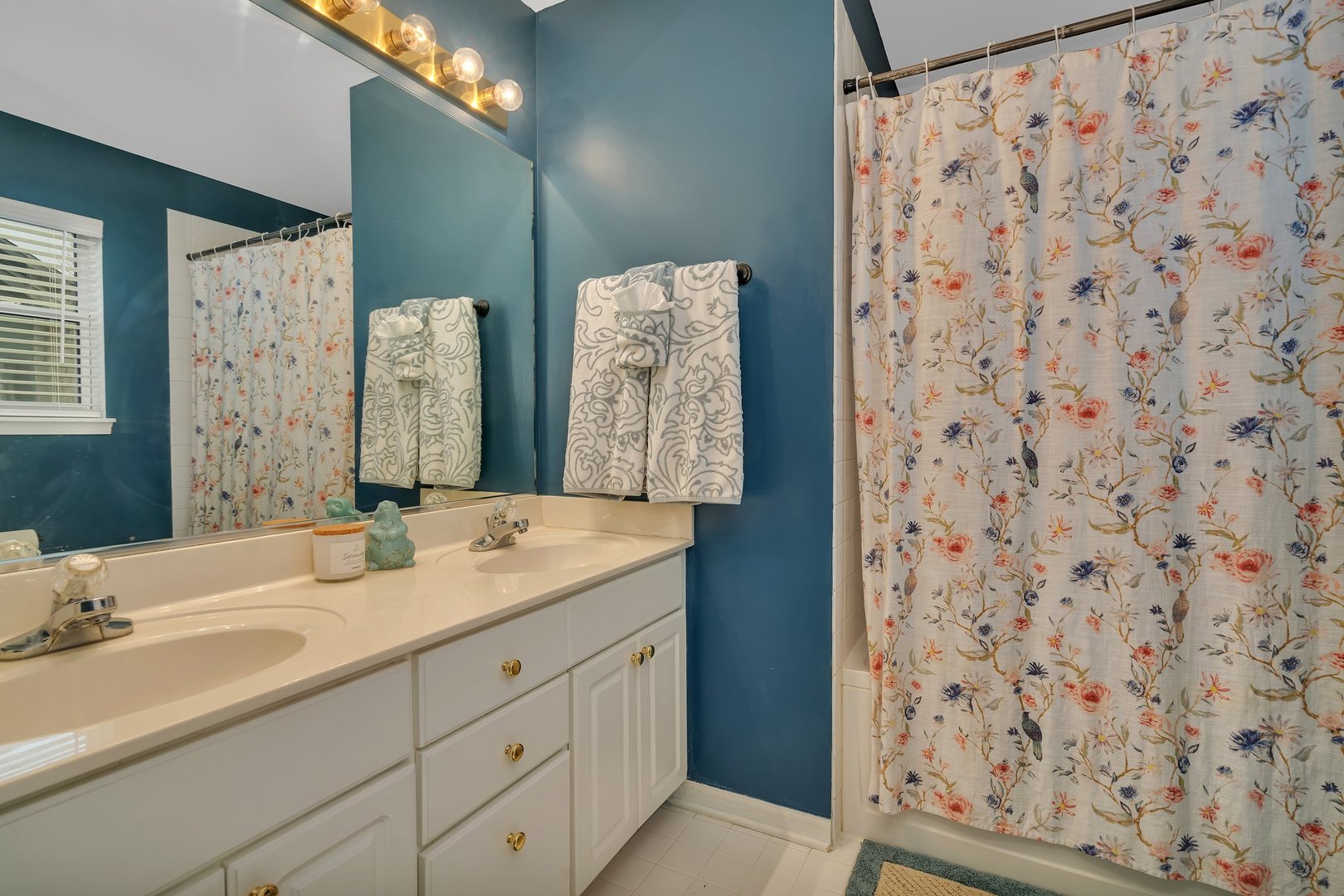7312 Atkinson Circle Plainfield, IL 60586 - Photo 16 of 27 a bathroom with a sink and a mirror