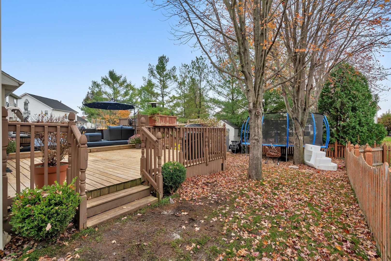7312 Atkinson Circle Plainfield, IL 60586 - Photo 22 of 27 a view of a backyard with sitting area