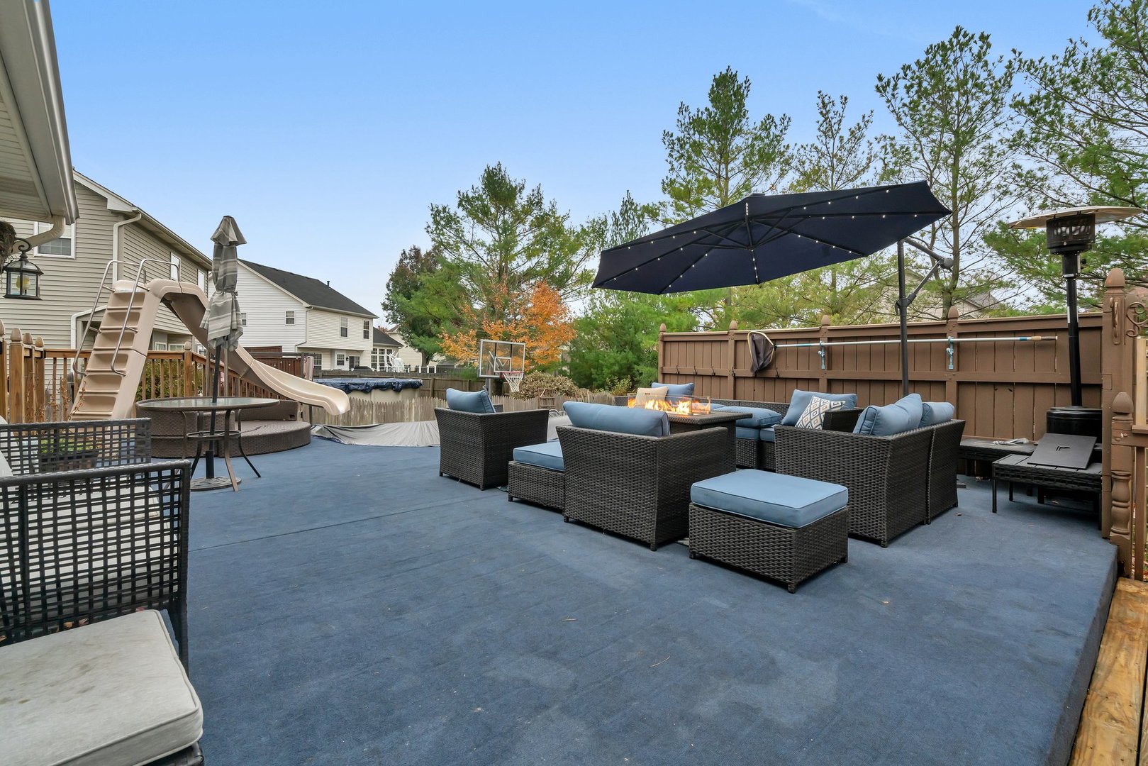 7312 Atkinson Circle Plainfield, IL 60586 - Photo 23 of 27 a view of a patio with couches and potted plants