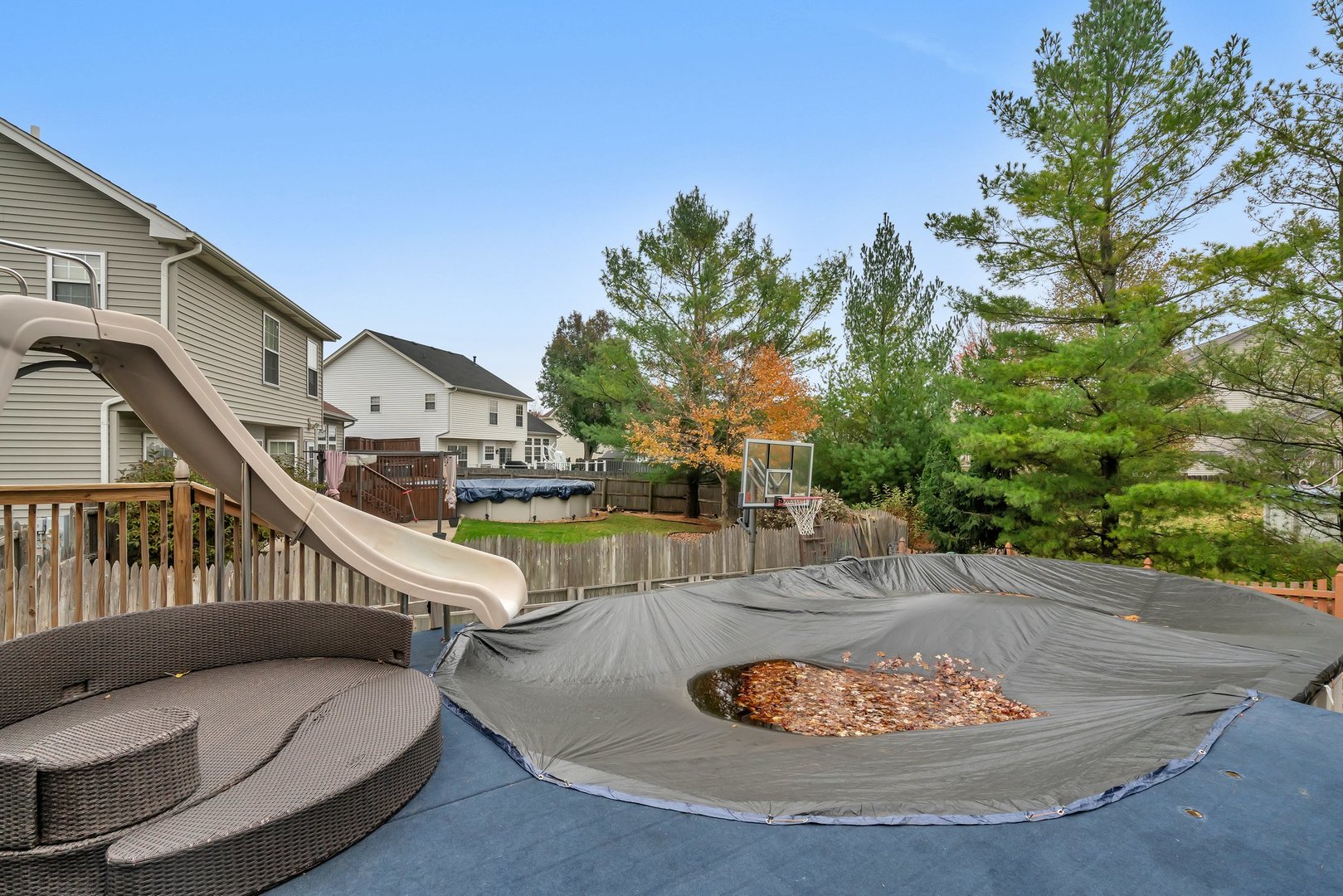 7312 Atkinson Circle Plainfield, IL 60586 - Photo 24 of 27 a balcony with table and chairs