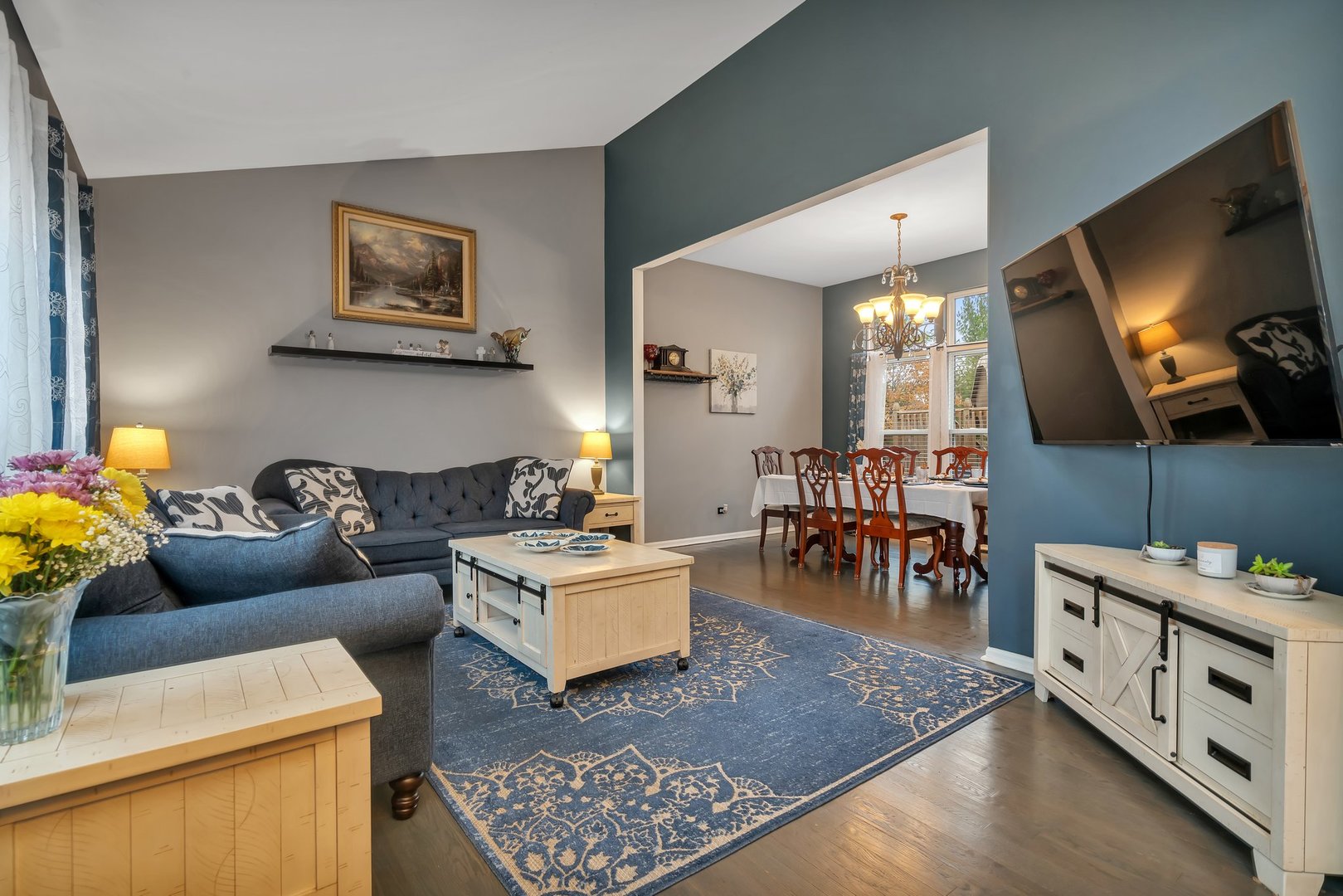 7312 Atkinson Circle Plainfield, IL 60586 - Photo 3 of 27 a living room with furniture and a flat screen tv