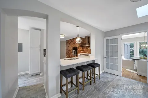 a view of a kitchen and dining room
