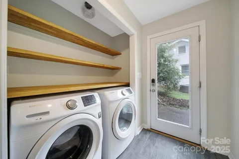 a view of washer and dryer in a utility room