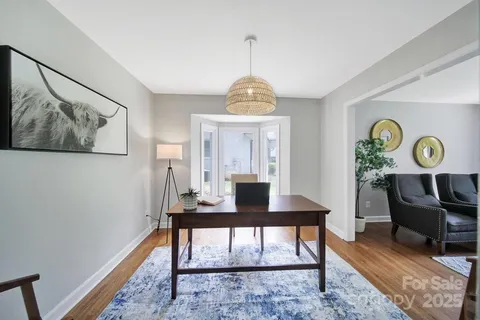 a workspace with furniture and window